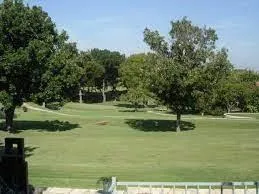 a view of swimming pool with a yard
