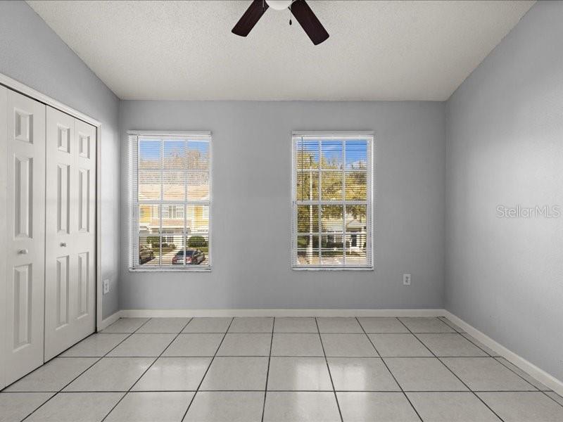 29924 Playa Del Rey Lane Wesley Chapel, FL 33543 - Photo 11 of 31 an empty room with closet and window