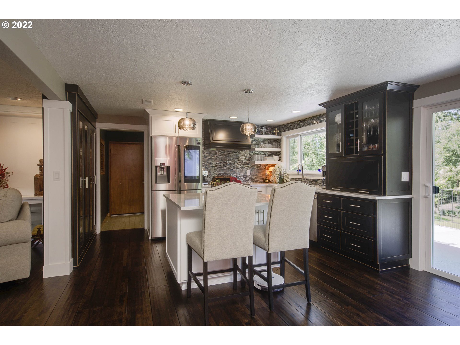 10419 Crosby Road Northeast Woodburn, OR 97071 - Photo 11 of 32 a kitchen with a table and chairs