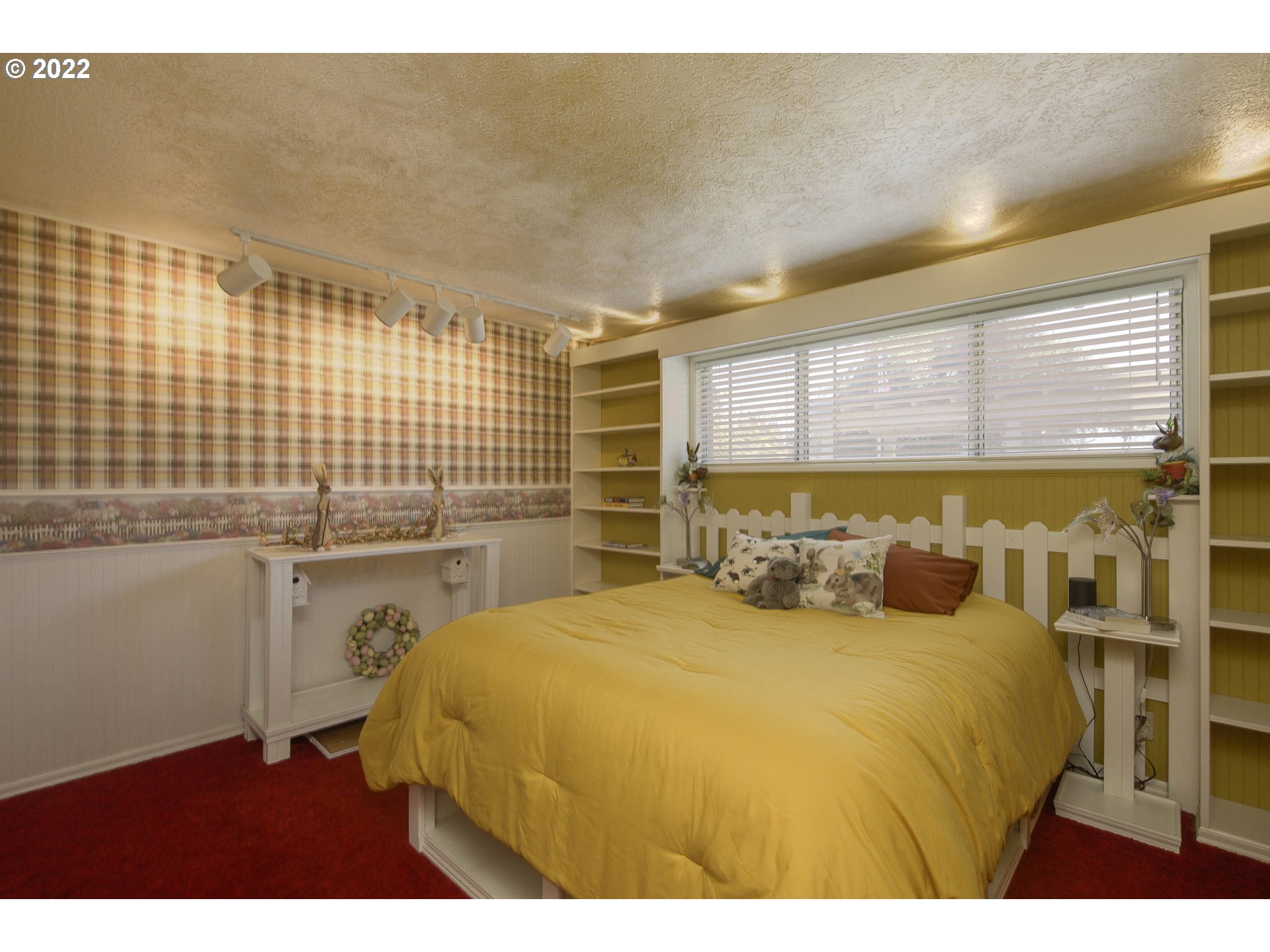 10419 Crosby Road Northeast Woodburn, OR 97071 - Photo 15 of 32 a bedroom with a bed and a night stand