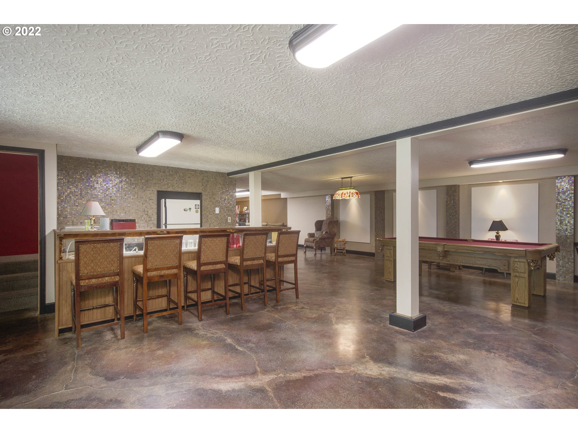 10419 Crosby Road Northeast Woodburn, OR 97071 - Photo 19 of 32 a view of a dining room with furniture