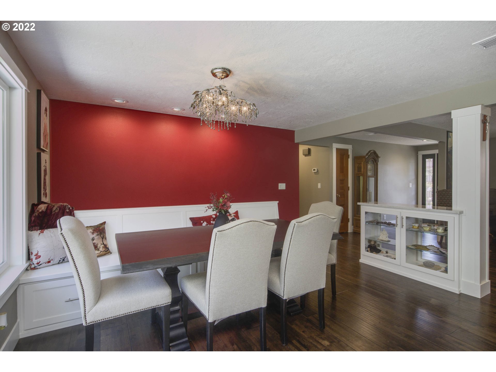 10419 Crosby Road Northeast Woodburn, OR 97071 - Photo 9 of 32 a view of a dining room with furniture and wooden floor