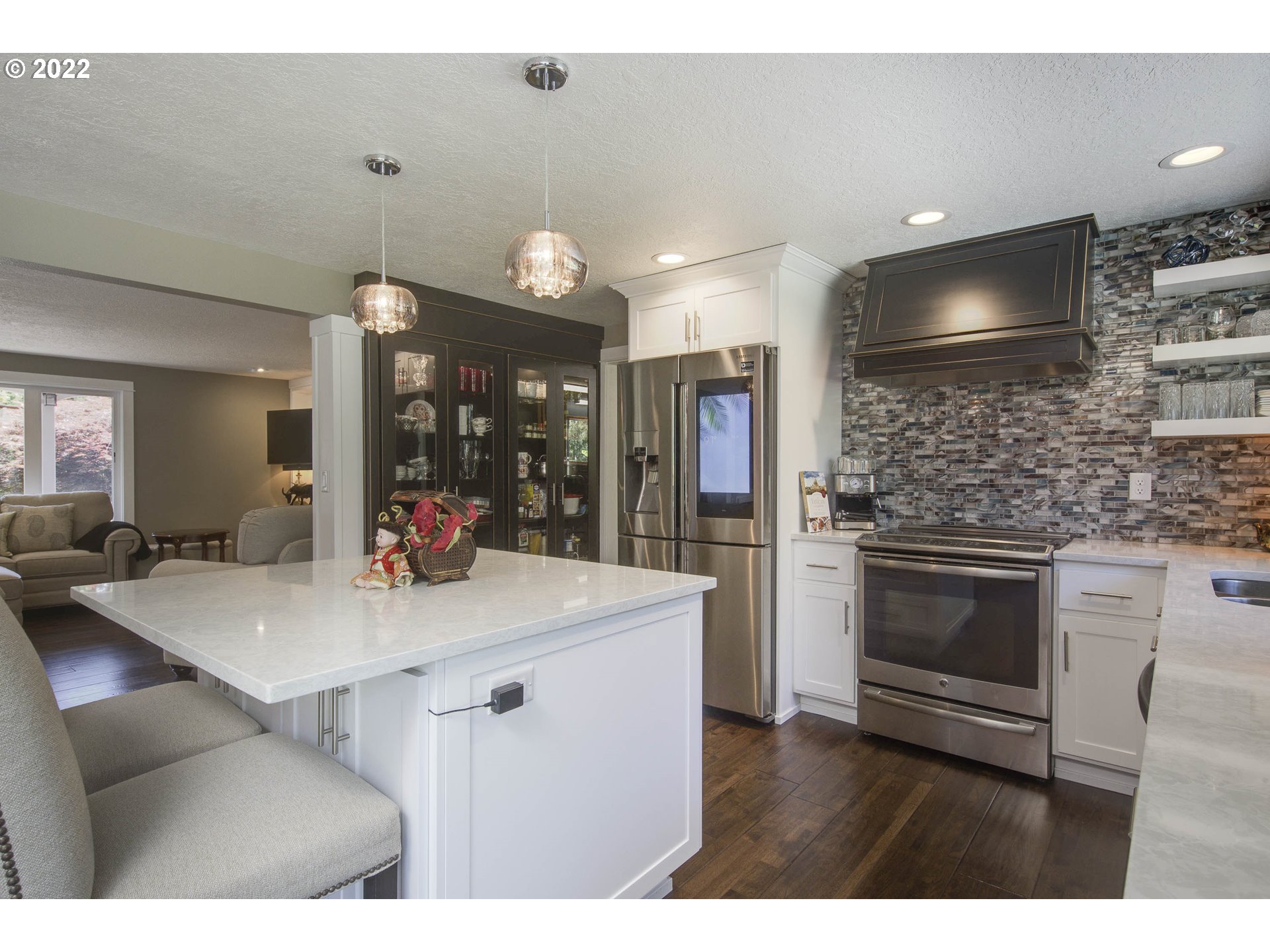 10419 Crosby Road Northeast Woodburn, OR 97071 - Photo 10 of 32 a kitchen with a sink cabinets and wooden floor