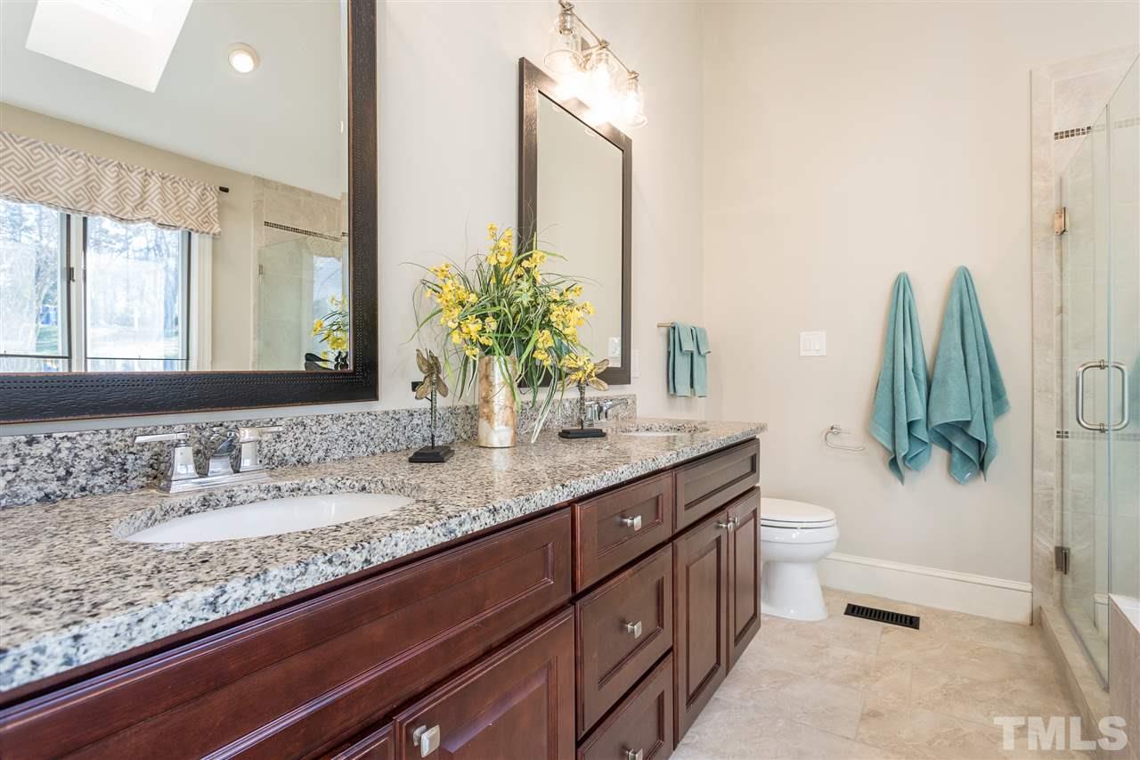 1421 Bascomb Drive Raleigh, NC 27614 - Photo 15 of 30 with granite vanity, frameless shower and jetted tub