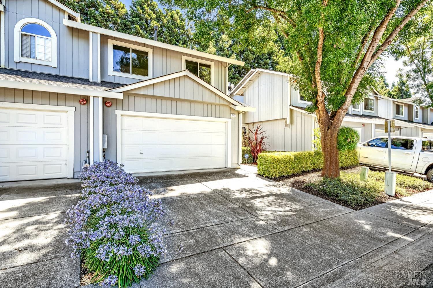 7448 Madera Place Rohnert Park, CA 94928 - Photo 1 of 1 a front view of a house with garden