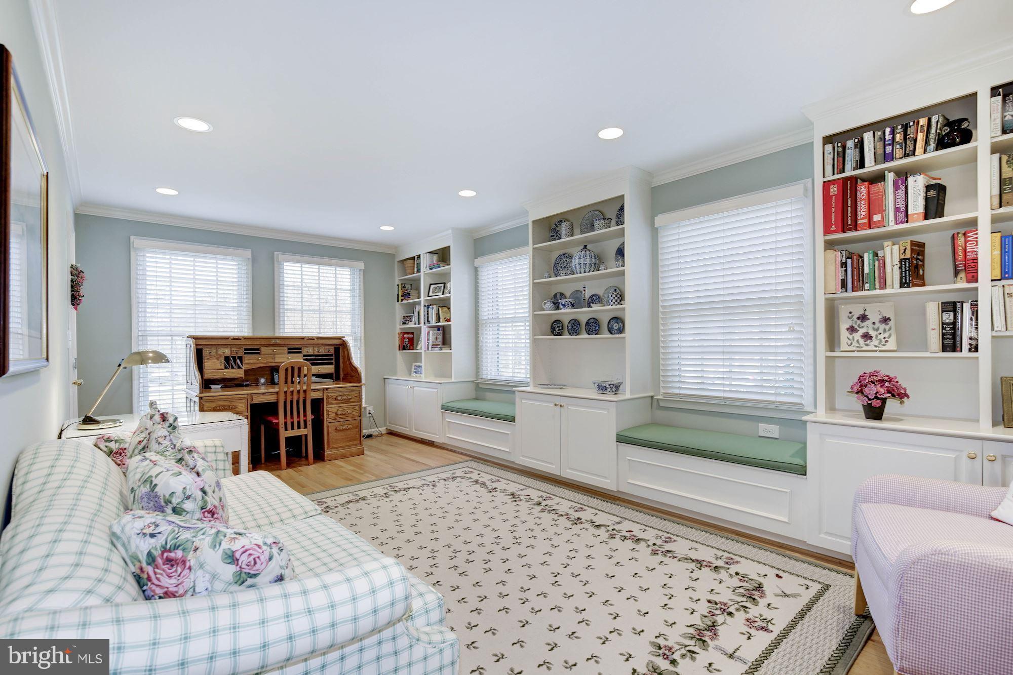 8821 Belmart Road Potomac, MD 20854 - Photo 11 of 29 a living room with furniture and a couch