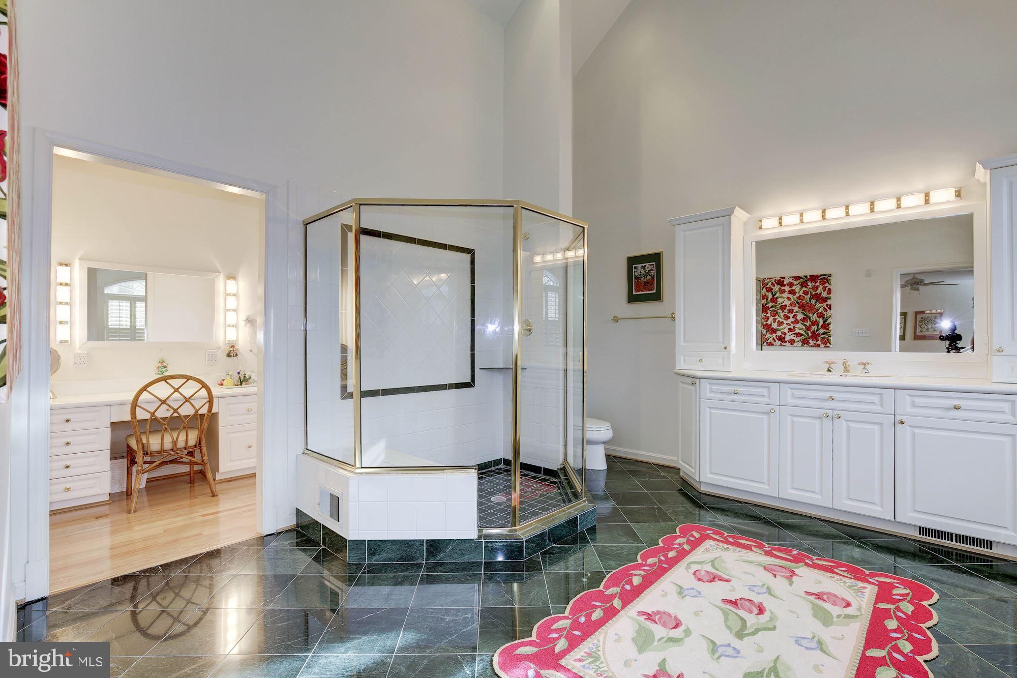 8821 Belmart Road Potomac, MD 20854 - Photo 16 of 29 a living room with furniture and a table