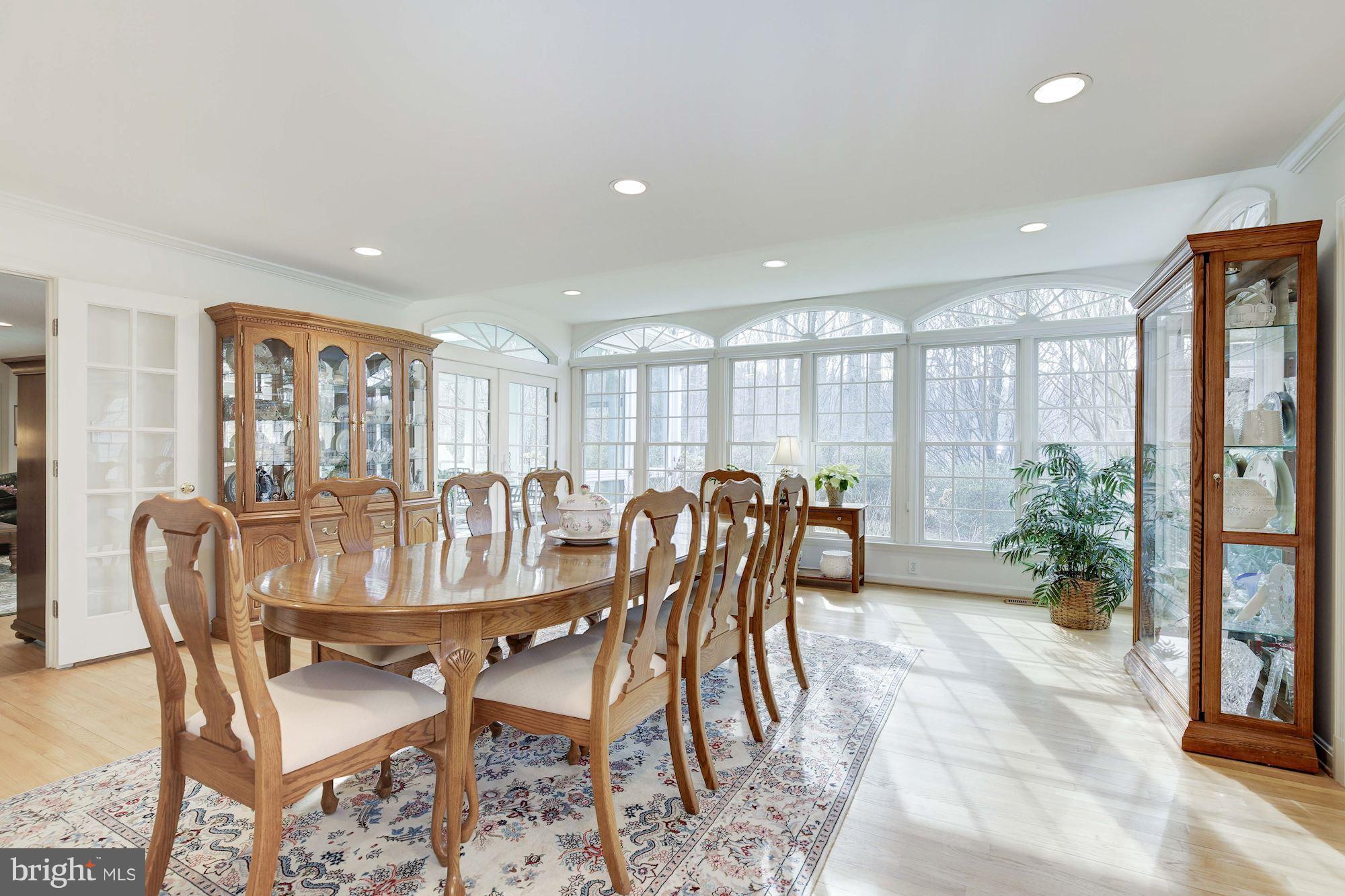 8821 Belmart Road Potomac, MD 20854 - Photo 4 of 29 a view of a dining room with furniture window and outside view