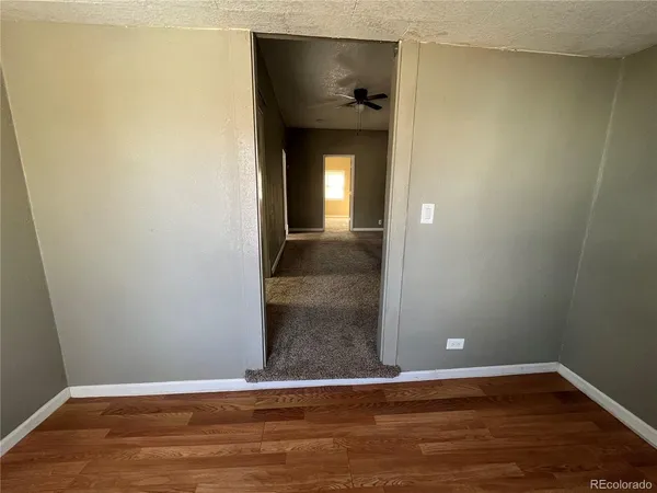 a view of a yard covered in snow