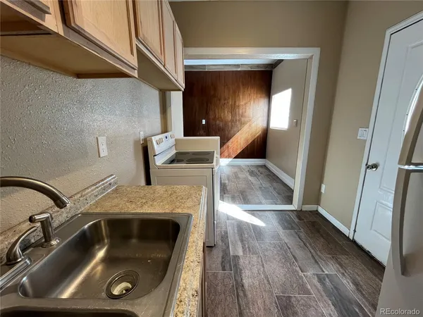 a bathroom with a sink and mirror