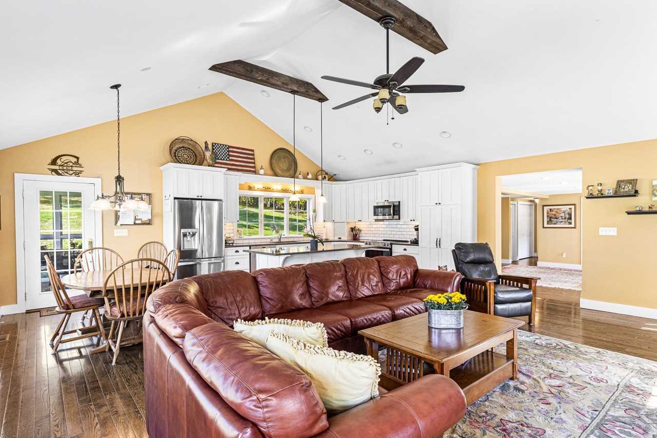 368 Skiba Road Gallatin, NY 12523 - Photo 13 of 40 a living room with furniture ceiling fan and a window