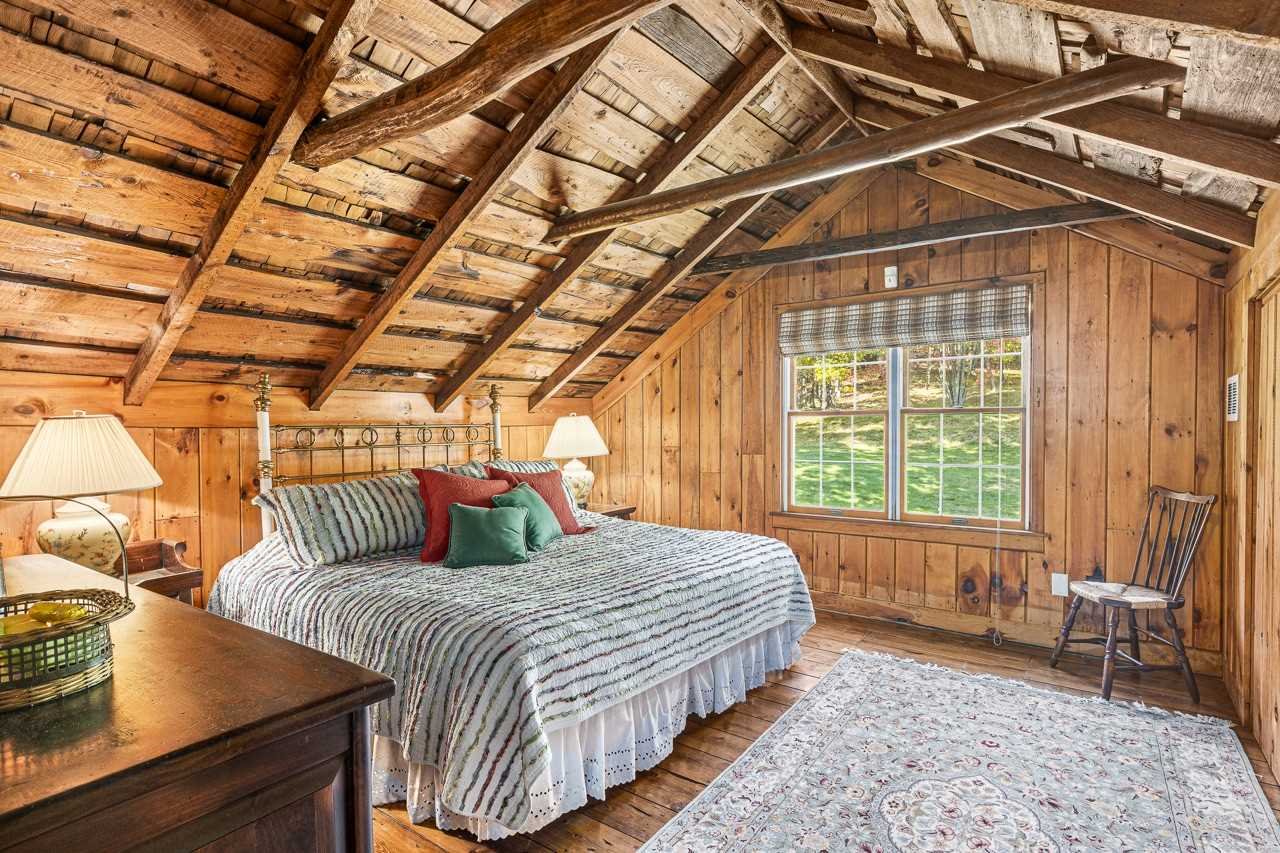 368 Skiba Road Gallatin, NY 12523 - Photo 20 of 40 a bedroom with a bed and wooden floor