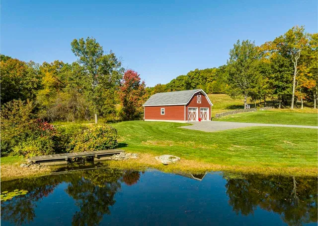 a view of swimming pool with an outdoor space and seating area