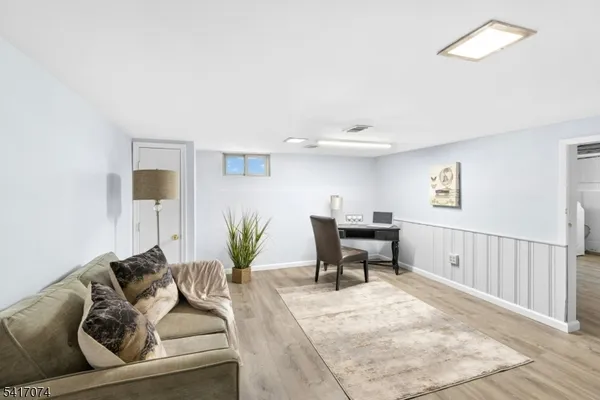 a living room with furniture and a table