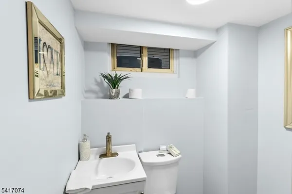 a bathroom with a sink and a toilet
