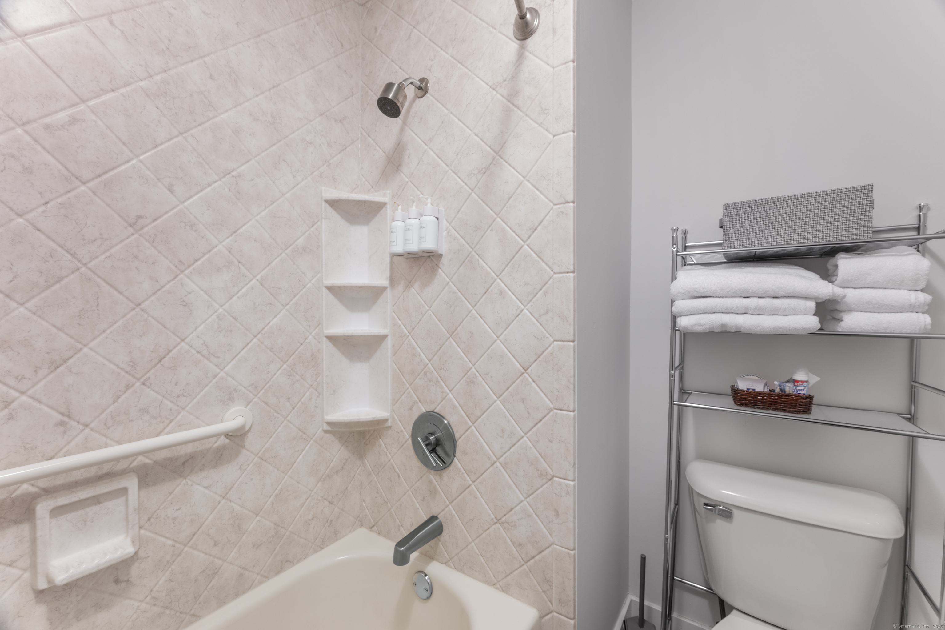 2124 Old Pond Lane, Unit 2124 Norwich, CT 06360 - Photo 14 of 30 a bathroom with a toilet and a shower