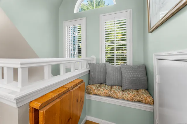 a view of an entryway with sitting area