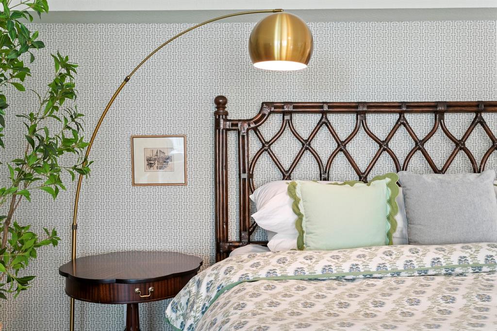 16332 Gulf Boulevard, Unit 3B Redington Beach, FL 33708 - Photo 14 of 91 a bedroom with a bed and a potted plant