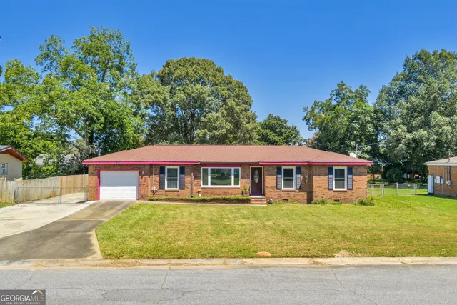 a view of a house with a big yard