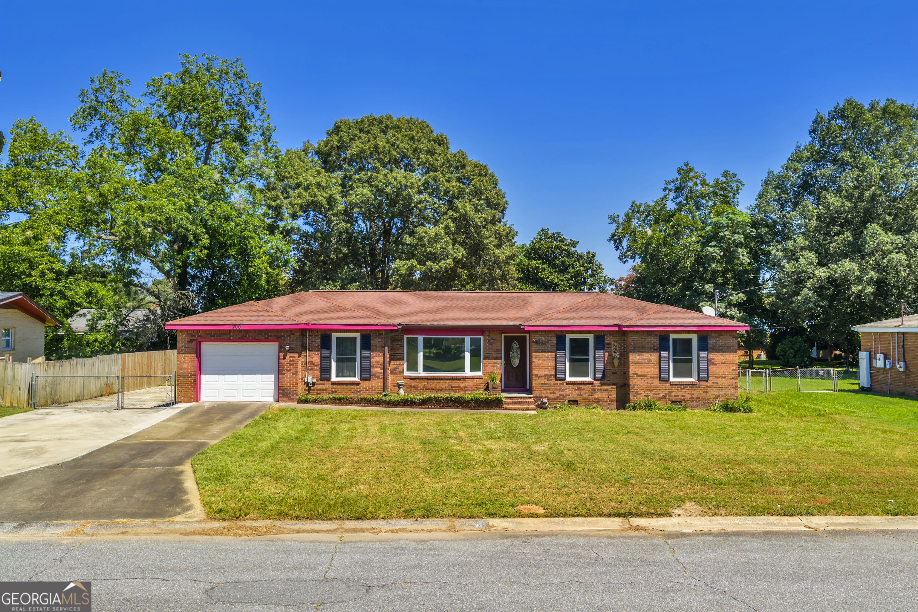 a view of a house with a big yard