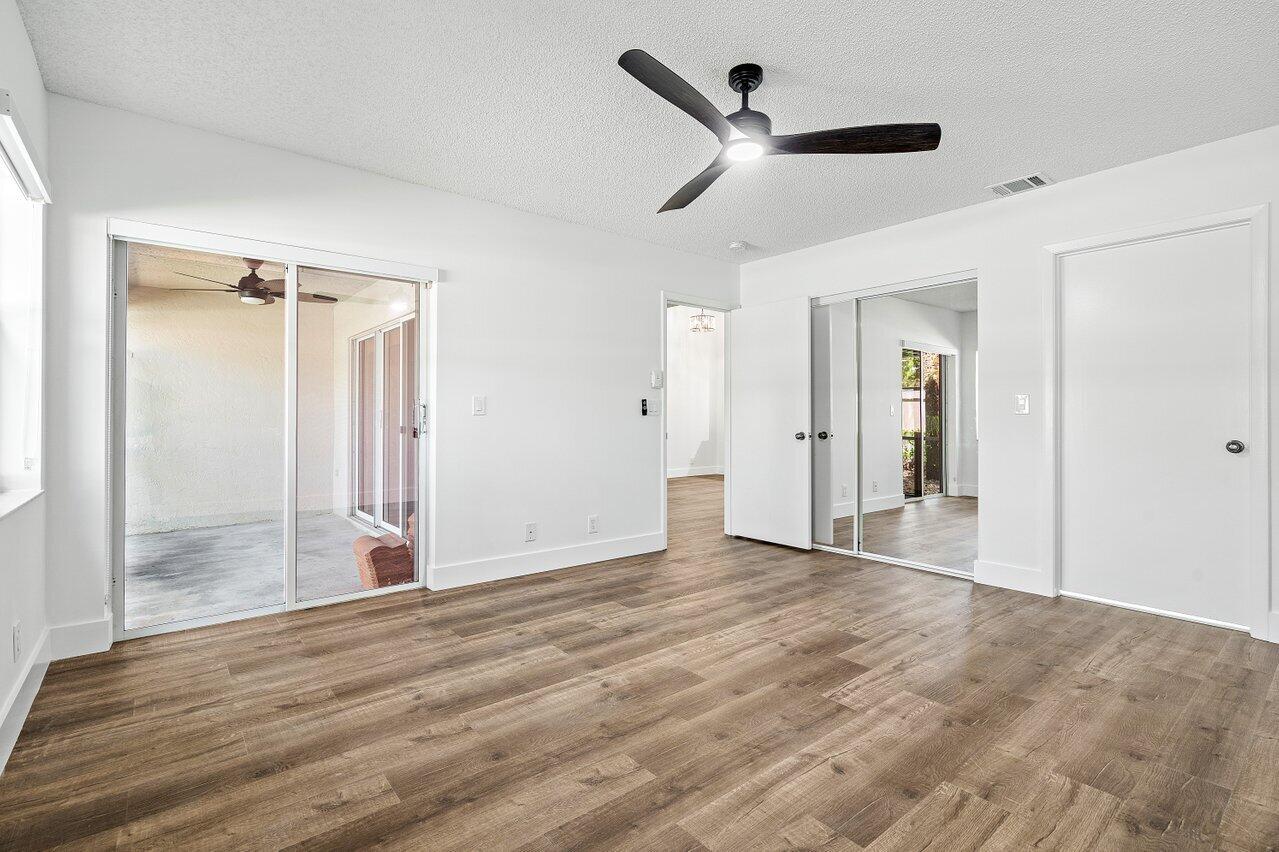 10478 Mateo Court Boca Raton, FL 33498 - Photo 21 of 50 DOWNSTAIRS MASTER BEDROOM