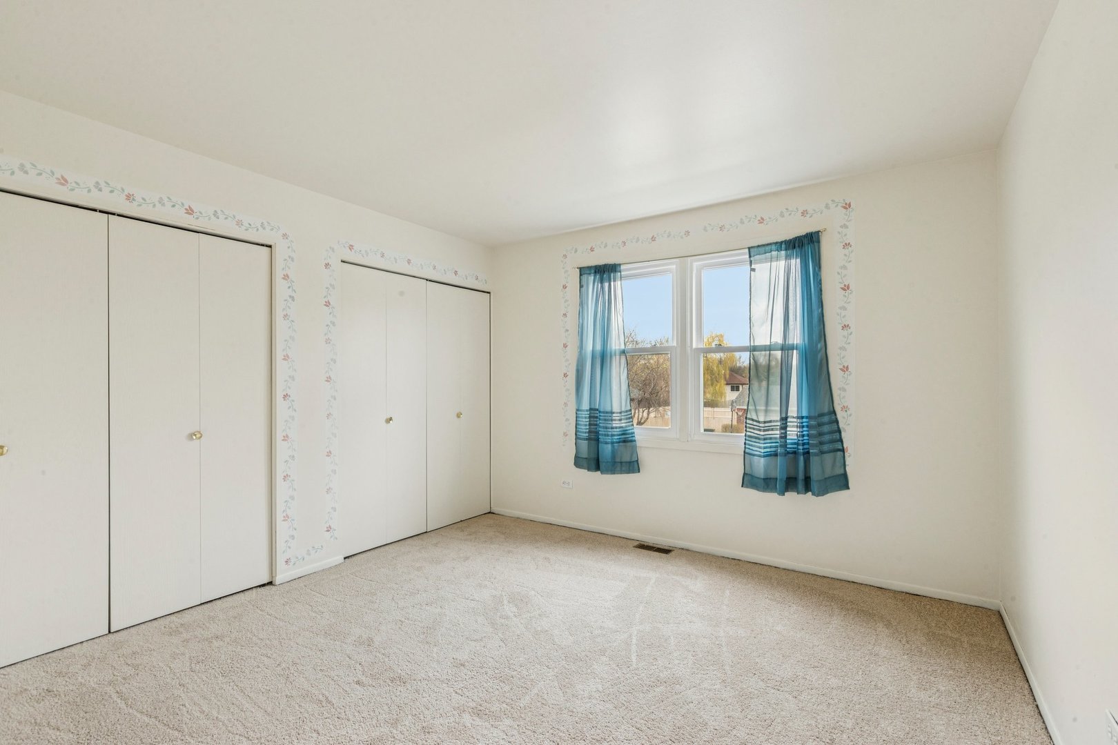 18604 Carpenter Street Homewood, IL 60430 - Photo 14 of 31 an empty room with windows