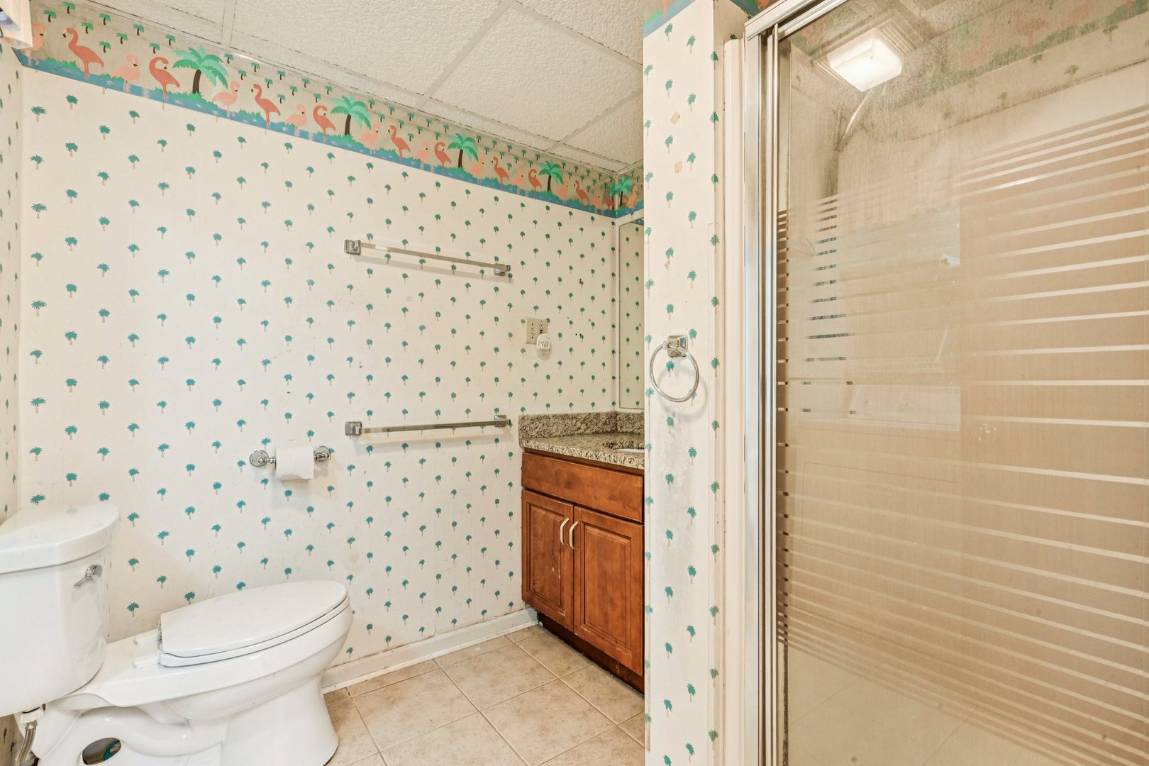 18604 Carpenter Street Homewood, IL 60430 - Photo 22 of 31 a bathroom with a toilet and a shower