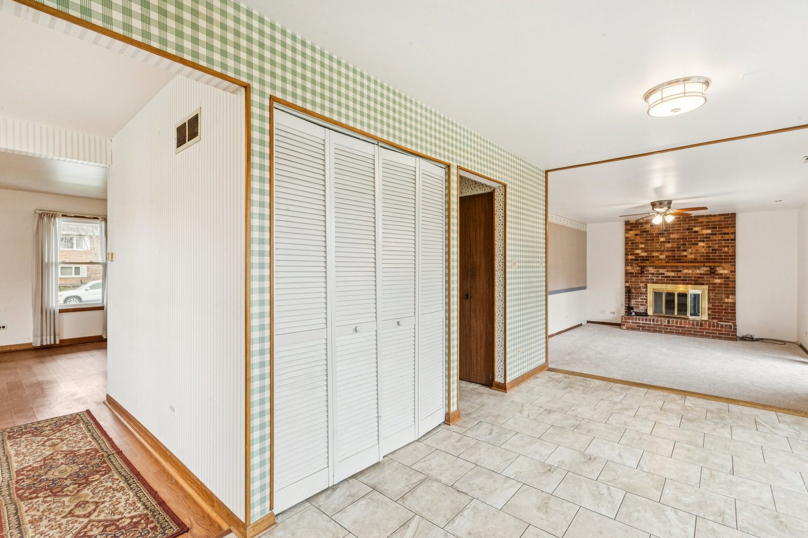 18604 Carpenter Street Homewood, IL 60430 - Photo 7 of 31 an empty room with windows