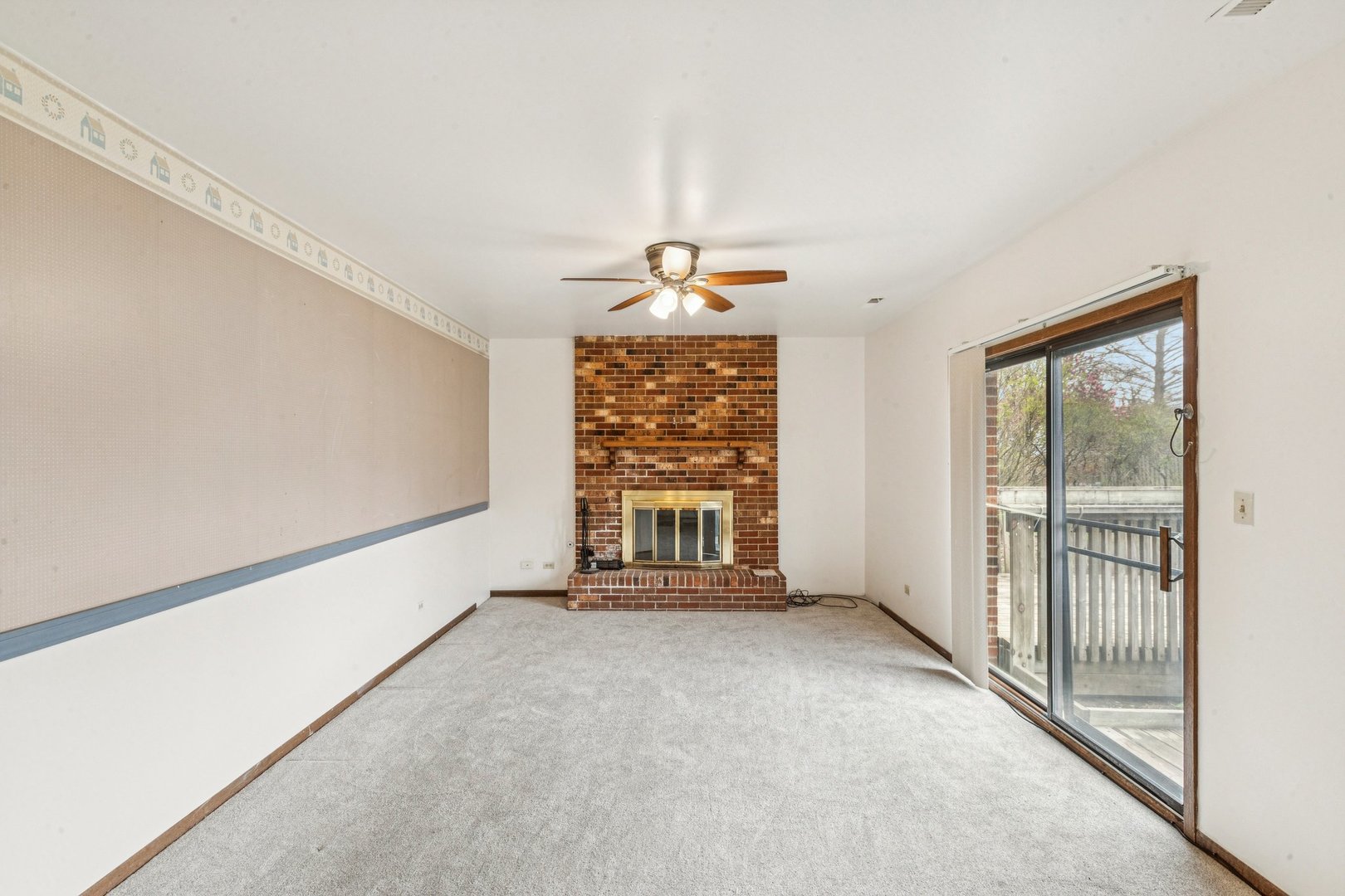 18604 Carpenter Street Homewood, IL 60430 - Photo 8 of 31 a view of an empty room with a window
