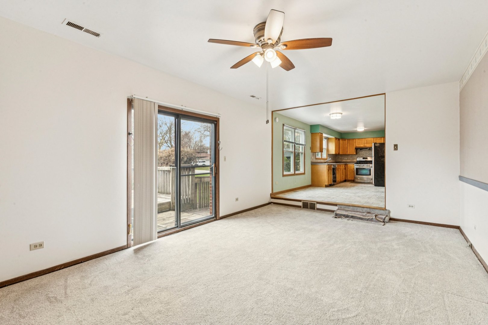 18604 Carpenter Street Homewood, IL 60430 - Photo 9 of 31 an empty room with fan and windows