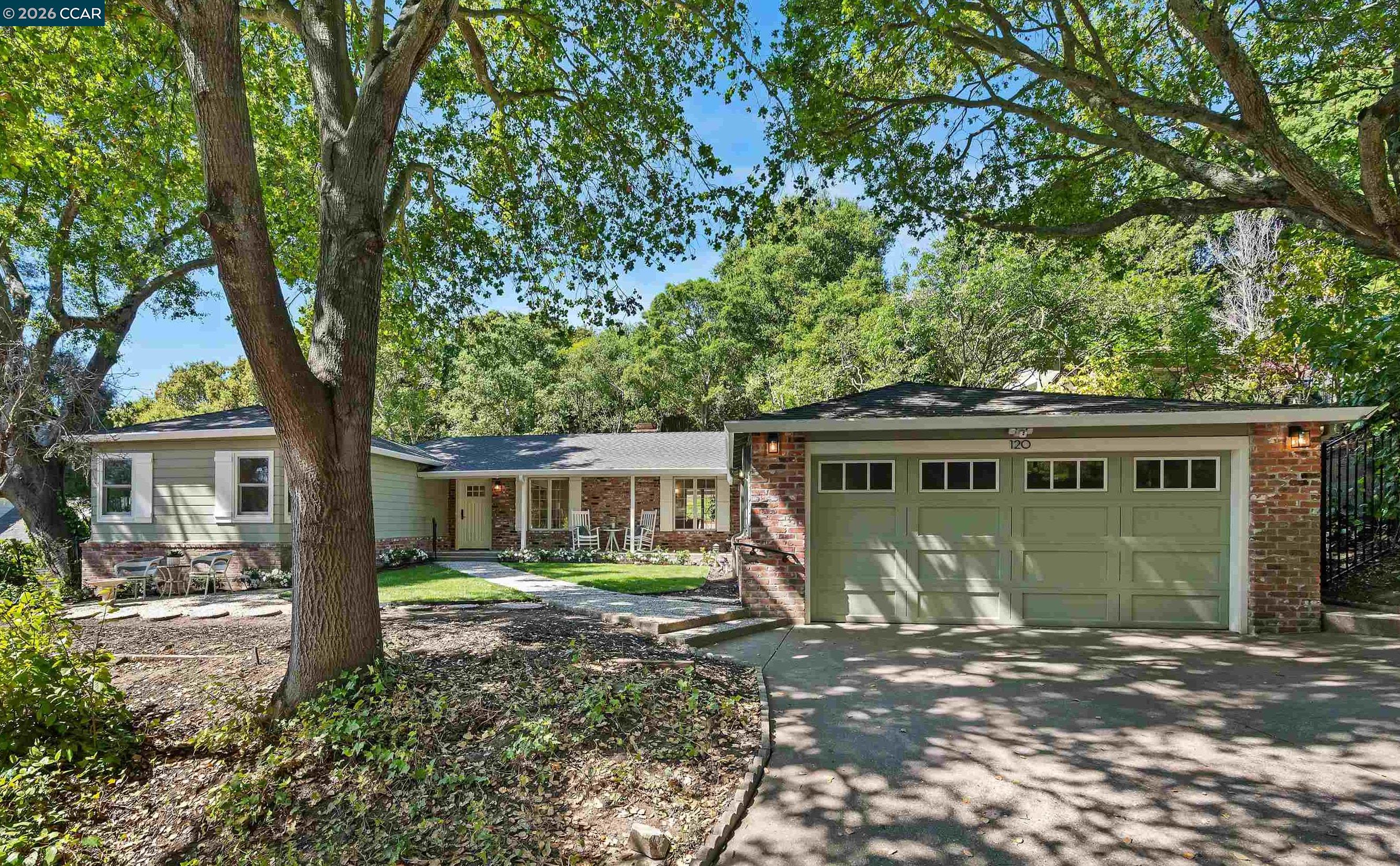 120 Las Vegas Road Orinda, CA 94563 - Photo 2 of 23 front view of a house with a yard