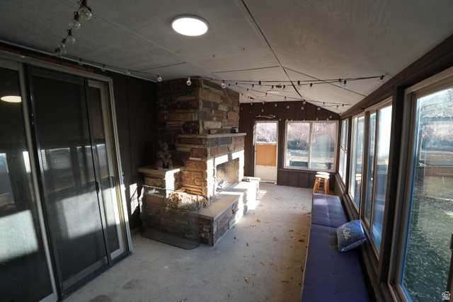 3711 North Canyon Road Provo, UT 84604 - Photo 32 of 42 Sunroom / solarium featuring concrete floors
