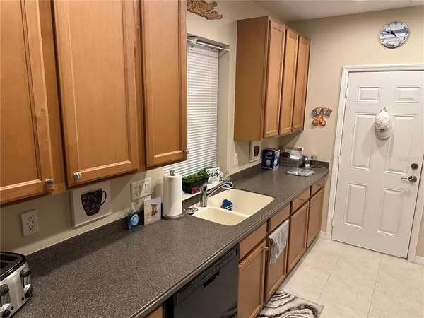 a bathroom with a sink double vanity and a mirror