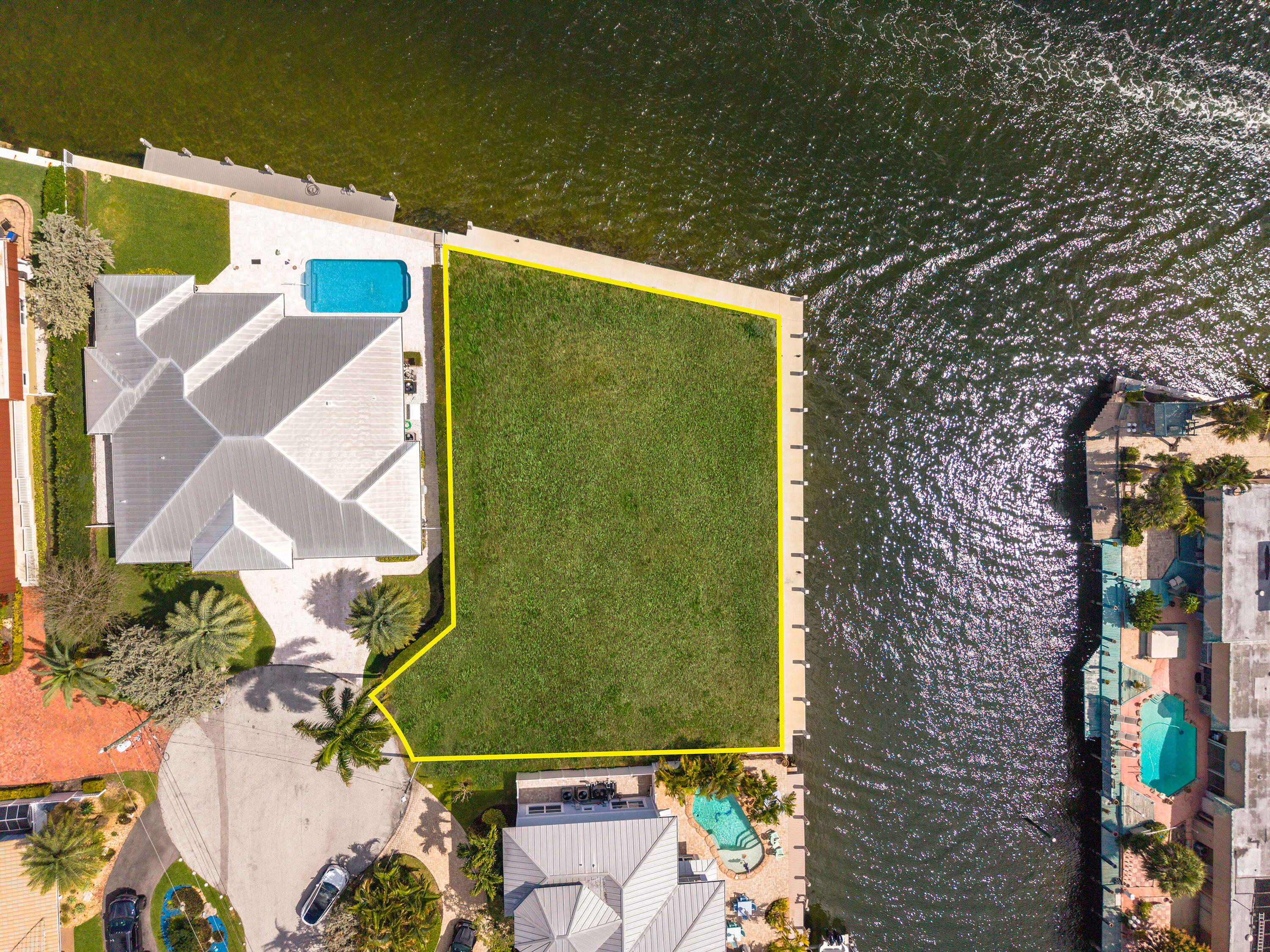 2748 Northeast 10th Street Pompano Beach, FL 33062 - Photo 8 of 10 an aerial view of a house with a yard