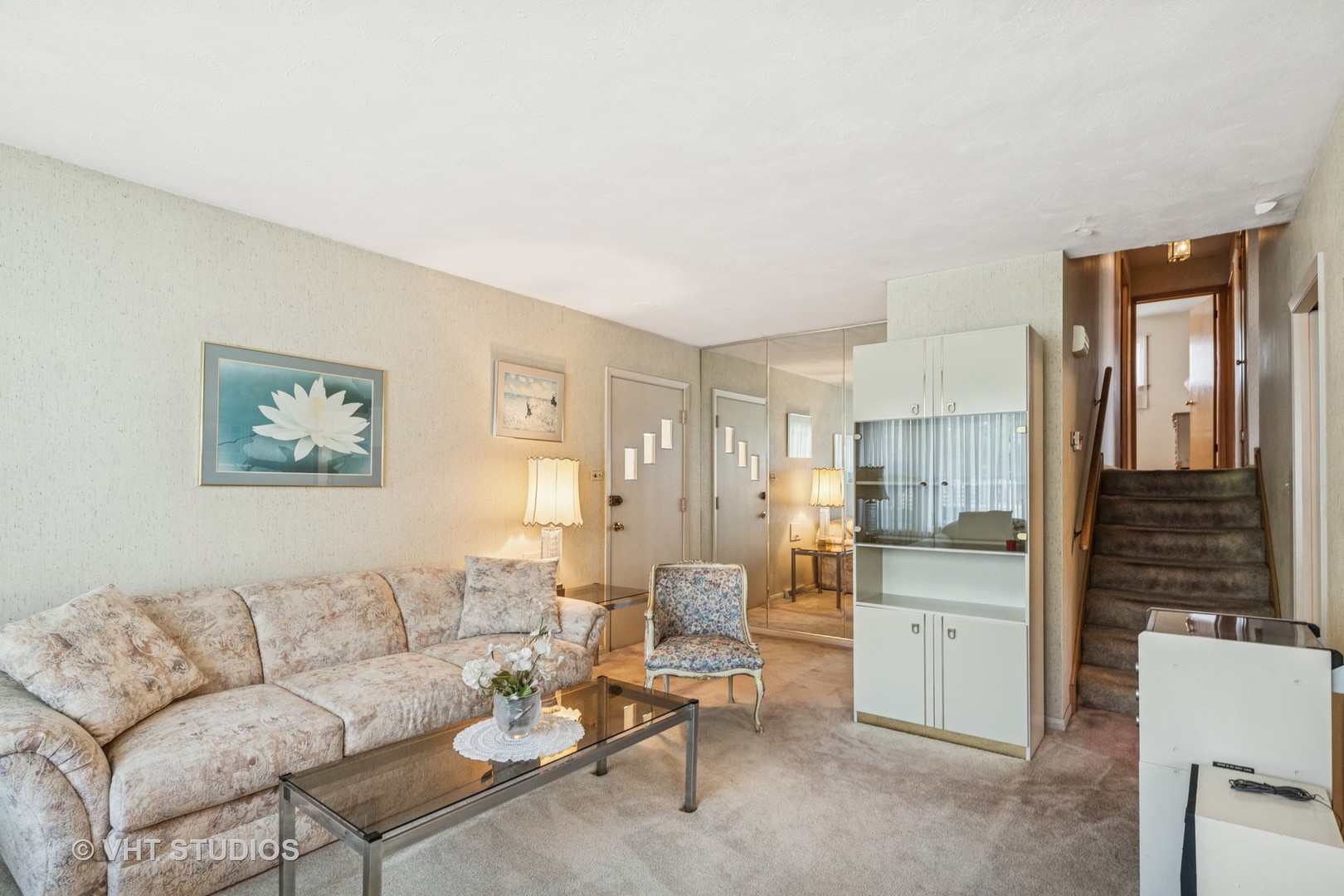 4143 West Devon Avenue Chicago, IL 60646 - Photo 4 of 22 a living room with furniture and a flat screen tv