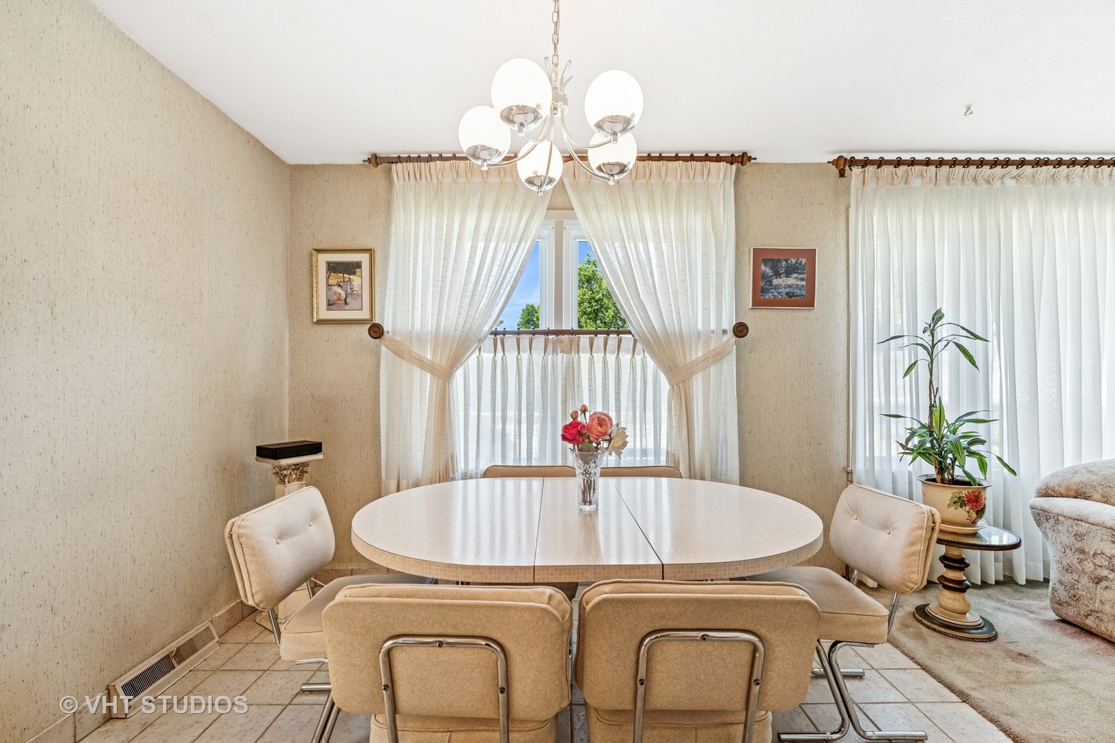 4143 West Devon Avenue Chicago, IL 60646 - Photo 8 of 22 a bathroom with a granite countertop sink a mirror and a bathtub