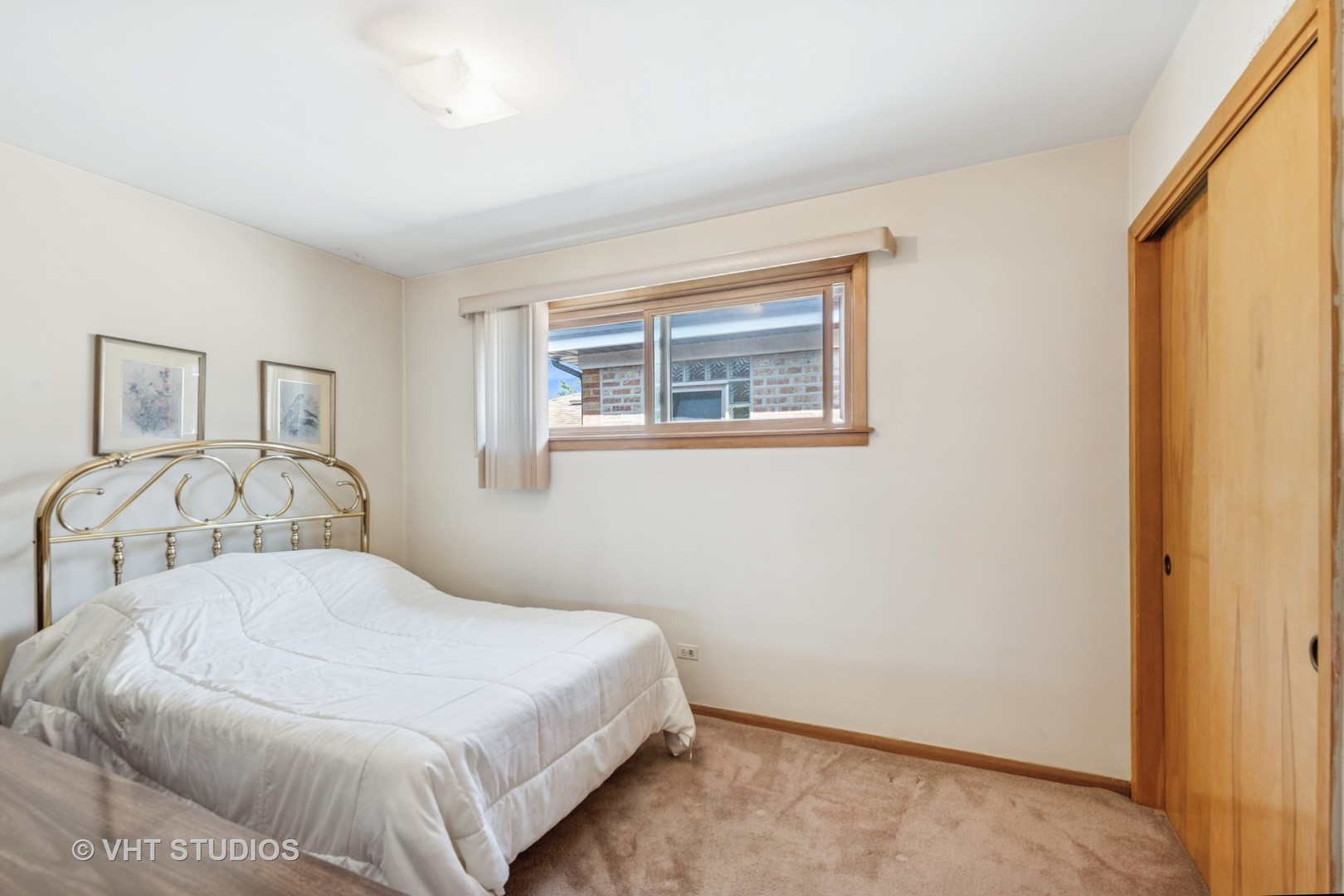 4143 West Devon Avenue Chicago, IL 60646 - Photo 9 of 22 a bedroom with a bed and a window