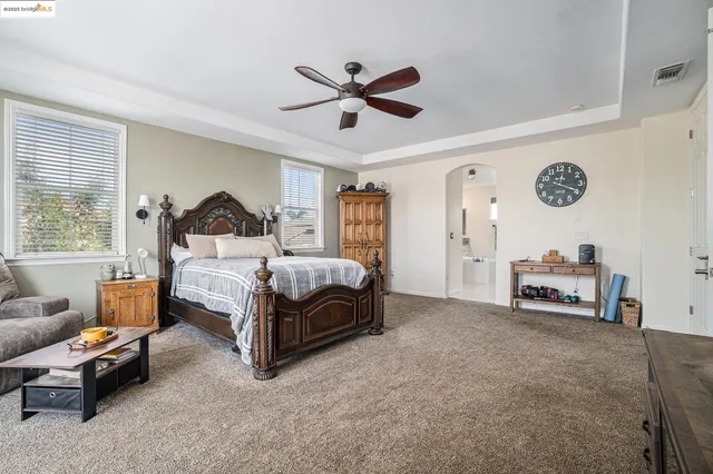 a view of a balcony with a yard and furniture