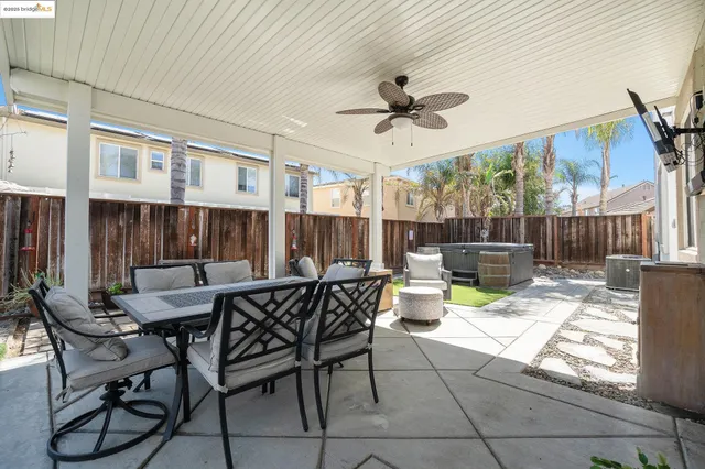 a view of an outdoor sitting area with furniture and garden