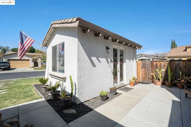 a front view of a house with patio