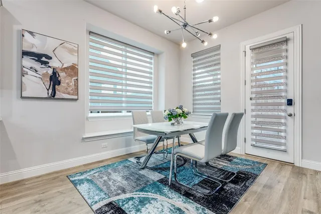 a work room with furniture and wooden floor