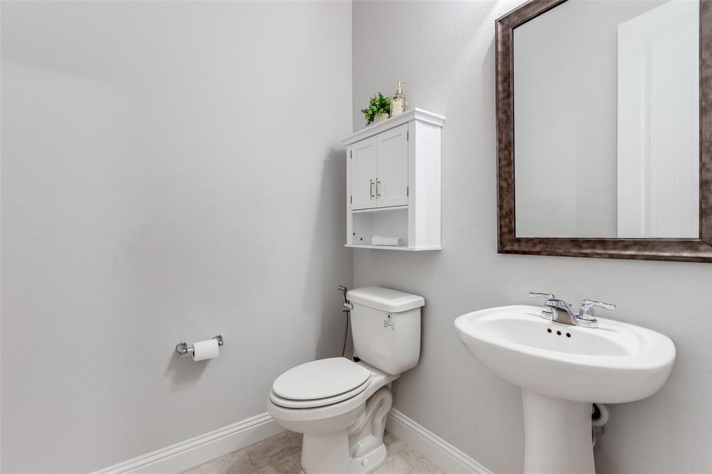 2951 Whitby Street Prosper, TX 75078 - Photo 22 of 37 Convenient half bathroom downstairs.