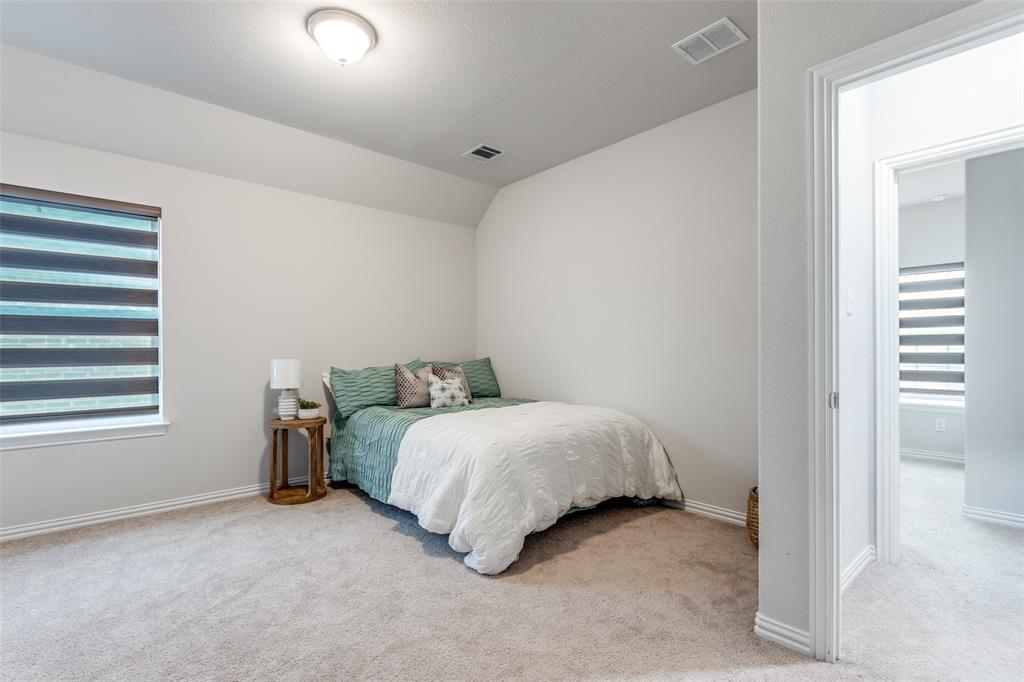 2951 Whitby Street Prosper, TX 75078 - Photo 26 of 37 Oversized secondary bedroom upstairs.