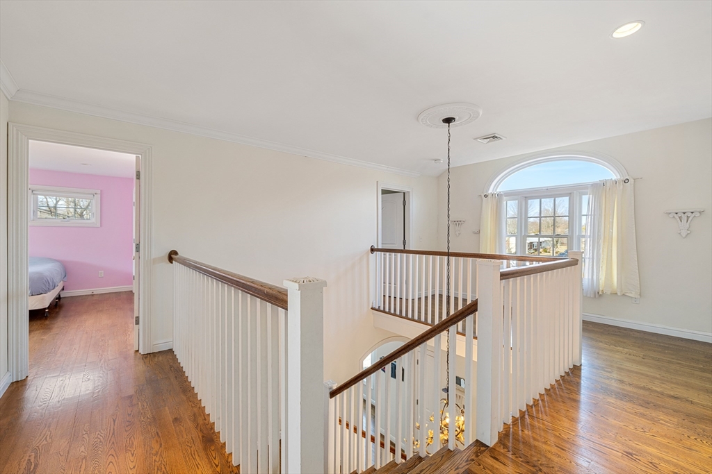 75 Cornell Road Marblehead, MA 01945 - Photo 15 of 26 a view of a hallway with wooden floor and stairs