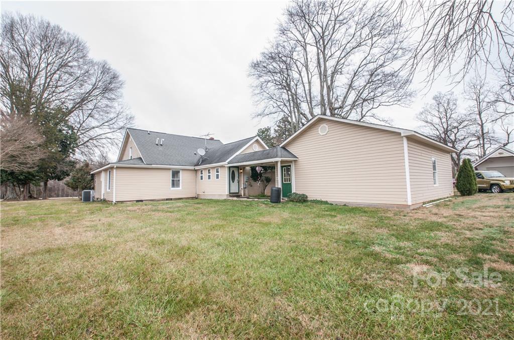 15655 Cool Springs Road Cleveland, NC 27013 - Photo 2 of 26 a house with trees in front of it