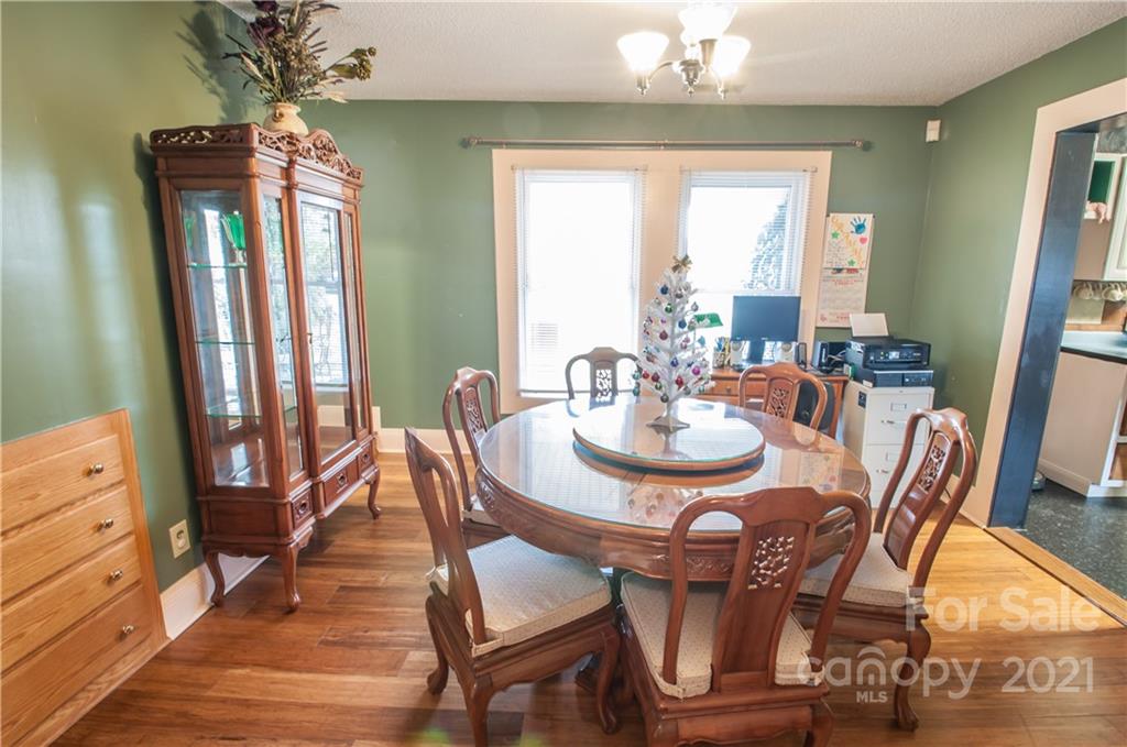 15655 Cool Springs Road Cleveland, NC 27013 - Photo 11 of 26 a view of a dining room with furniture and window