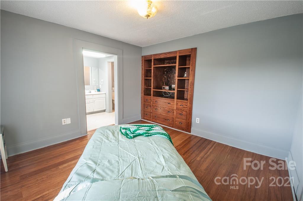 15655 Cool Springs Road Cleveland, NC 27013 - Photo 18 of 26 a bedroom with bed and window