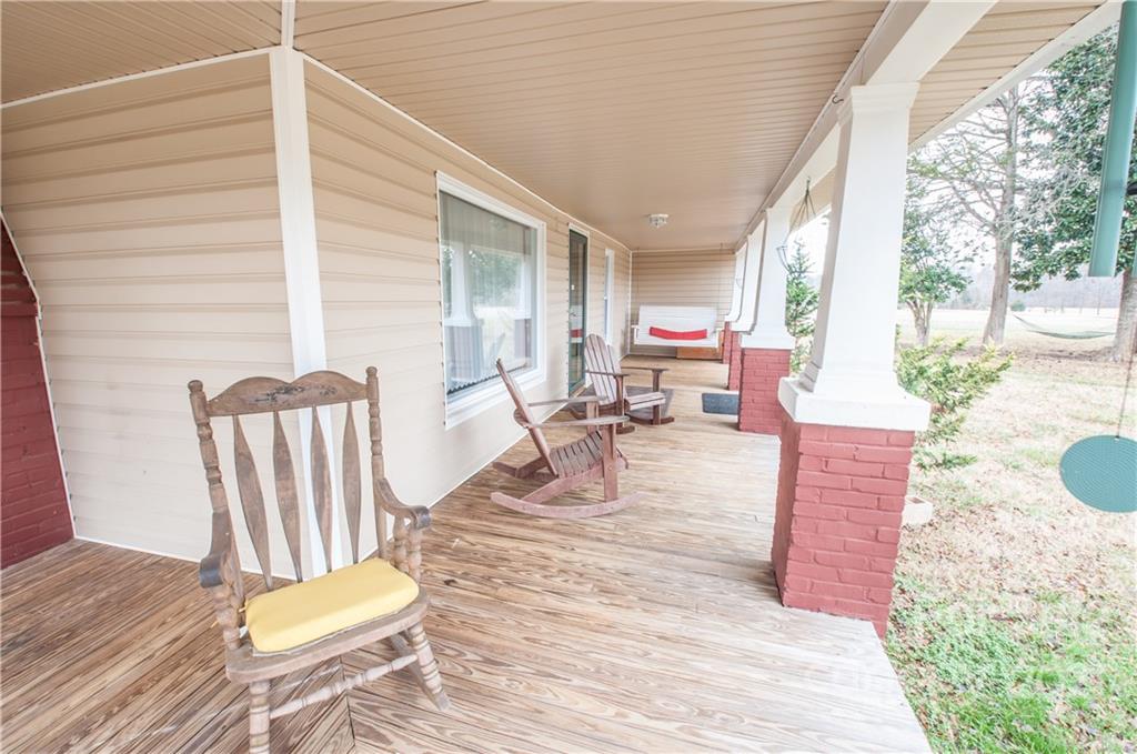 15655 Cool Springs Road Cleveland, NC 27013 - Photo 3 of 26 a view of a patio with wooden floor