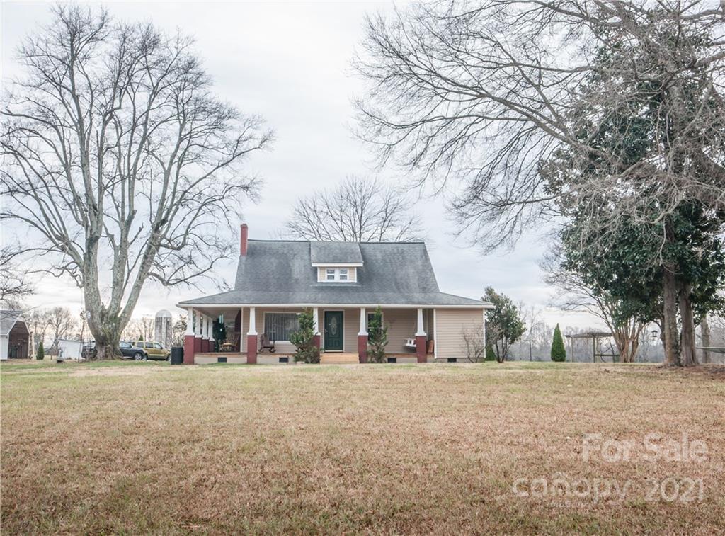 15655 Cool Springs Road Cleveland, NC 27013 - Photo 24 of 26 a front view of house with a trees