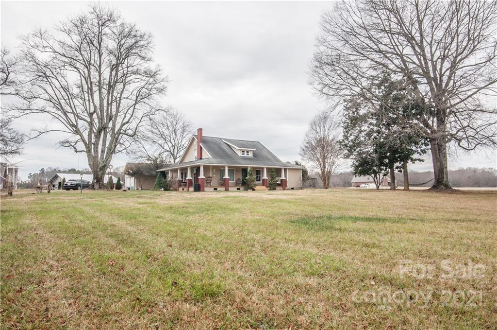 15655 Cool Springs Road Cleveland, NC 27013 - Photo 26 of 26 a front view of a house with a garden